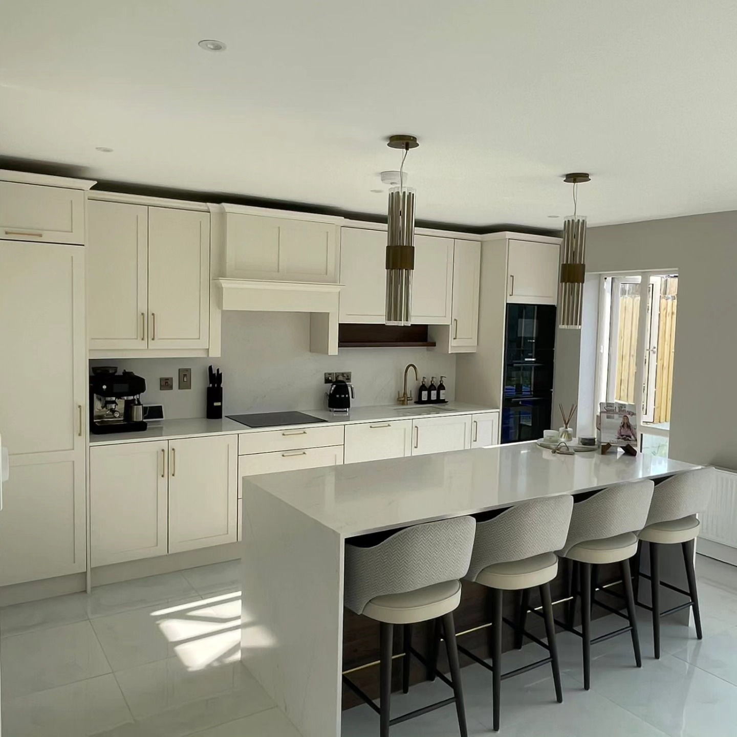 Bespoke cream in-frame kitchen with marble-topped island, made in Co. Kilkenny
